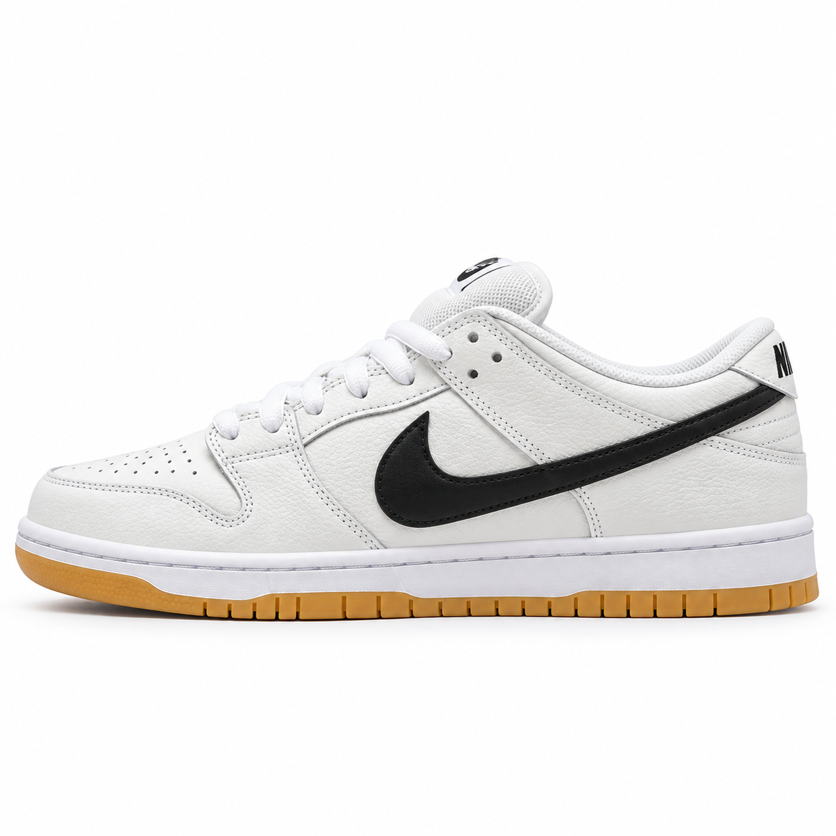 Nike Dunk Low blanco con Swoosh negro y suela gum, perfil interior
