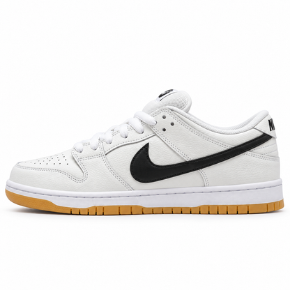Nike Dunk Low blanco con Swoosh negro y suela gum, perfil interior